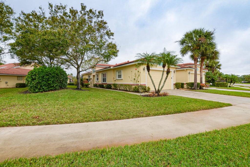 Photo of 1418 SW Greens Pointe Way, Palm City, FL 34990 (MLS # R10950222)