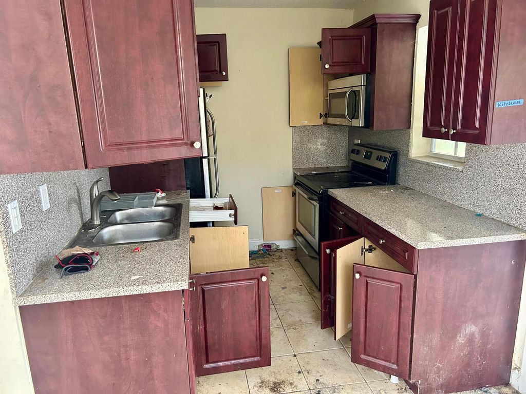 Photo of 810 N 69th Avenue, Hollywood, FL 33024 (MLS # B26003201)