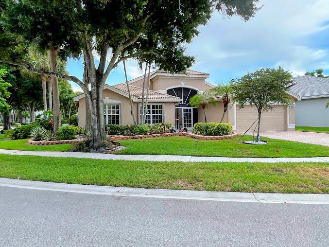 Spaceous 3-2 GRANADA model home awaits you in this exciting, GATED 55+ community.Bright arched ceiliengs with ceiling fans. Primary bedroom with tray ceiling. Ceramic FLOOR TILE throughout. Generac 22KW GENERATOR w/ propane tank. Eched transome windows, Clubhouse renovation COMPLETED ! ! ! PICKLEBALL COURTS UPGRADED TO hard surface ! ! ! Amenities include Cafe, Lagoon and Lap Pools, Pickleball, Tennis,Golf, Bike club, Fitness Center, Water activities, Yoga, Zumba, Visual Arts, Theater Productions and so much more! Dining room chandilier not included.Make Paradise your full-time residence,this home awaits the next buyer to live life to the fullest. Information is deemed to be reliable, but isnot guarantee