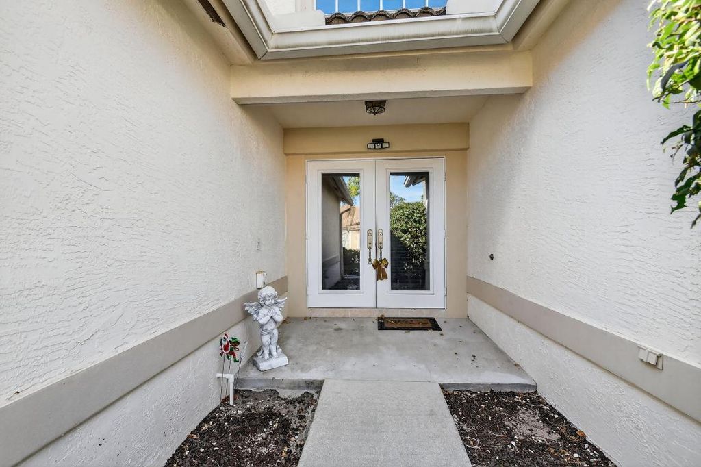 Photo of 2725 Pointe Circle, Greenacres, FL 33413 (MLS # R11156160)