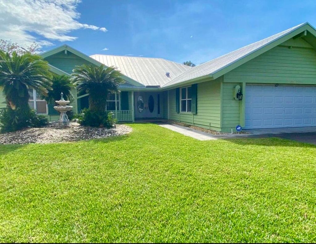 Photo of 10340 SE Jupiter Narrows Drive, Hobe Sound, FL 33455 (MLS # R11145601)