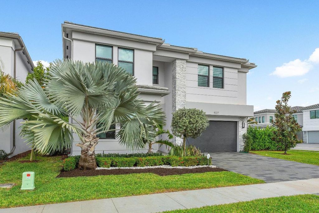 Photo of 8227 Oceanus Drive, Boca Raton, FL 33496 (MLS # R11065228)