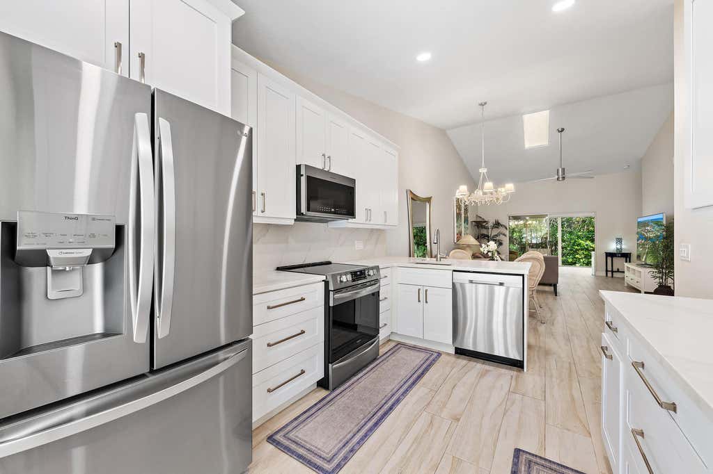 Photo of 11139 SE Sea Pines Circle, Hobe Sound, FL 33455 (MLS # B26063790)