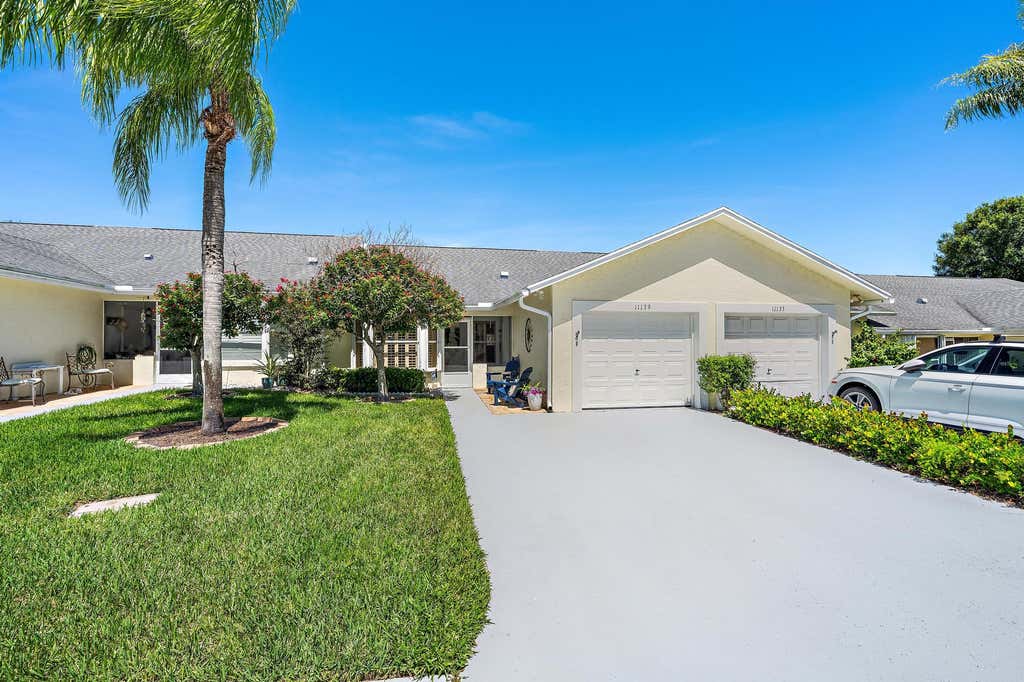 Photo of 11139 SE Sea Pines Circle, Hobe Sound, FL 33455 (MLS # B26063790)