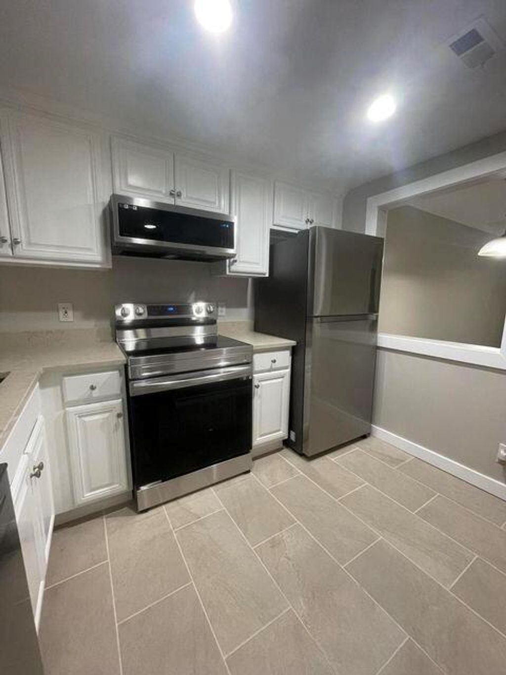 Photo of 1638 Embassy Drive #102, West Palm Beach, FL 33401 (MLS # R11139462)