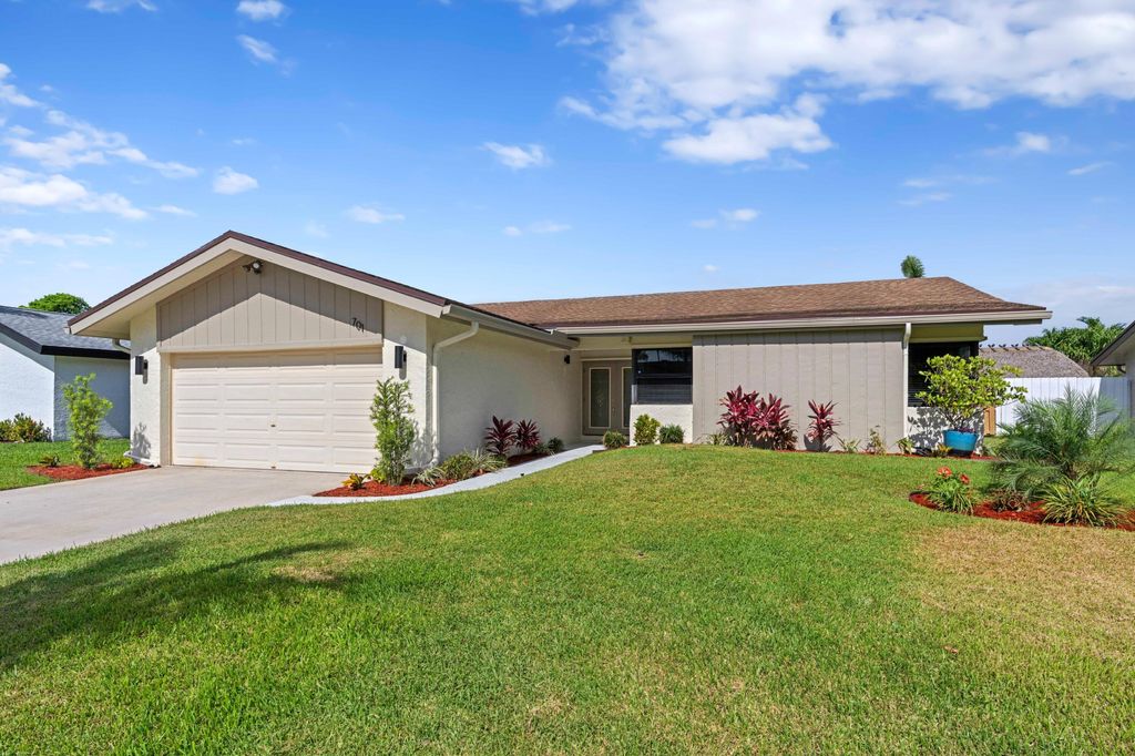 Photo of 701 NW 48th Avenue, Coconut Creek, FL 33063 (MLS # B26034613)
