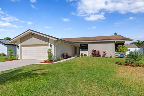 Photo of 701 NW 48th Avenue, Coconut Creek, FL 33063 (MLS # B26034613)