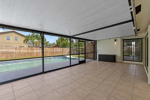 Tiny photo for 701 NW 48th Avenue, Coconut Creek, FL 33063 (MLS # B26034613)