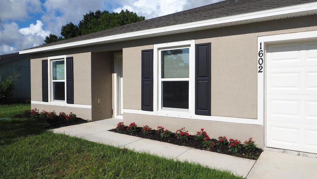 Photo of 1602 SE Mansfield Street, Port Saint Lucie, FL 34952 (MLS # R11115124)
