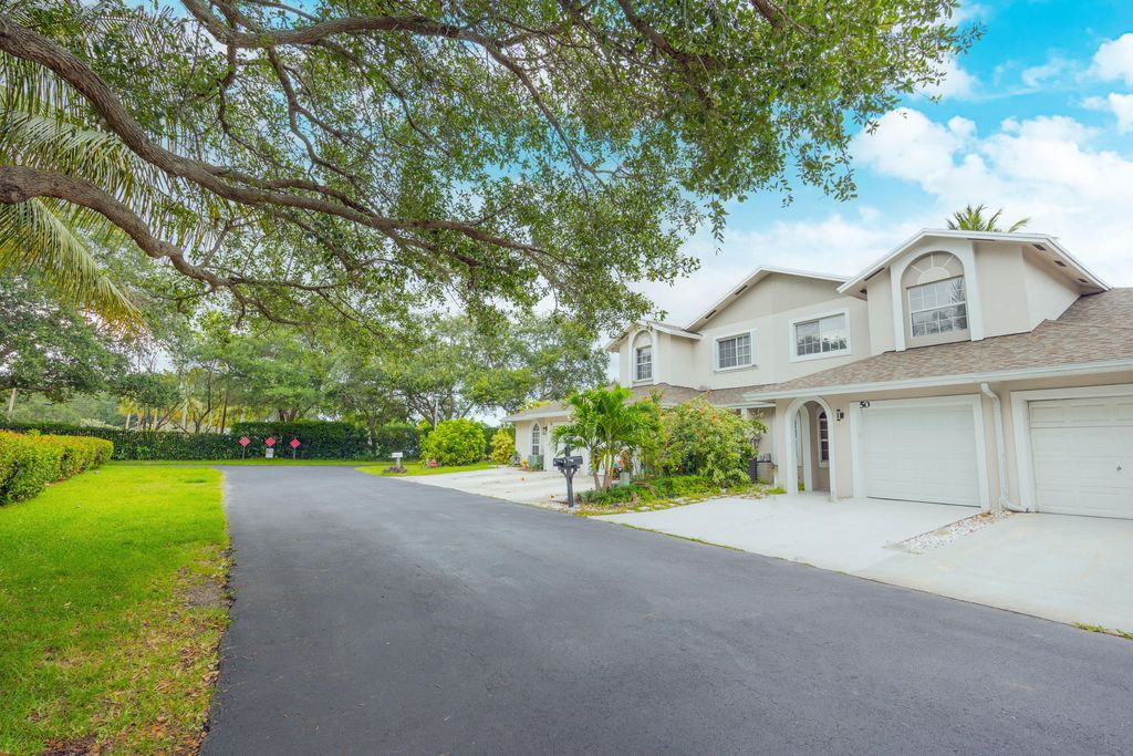 Photo of 50 Desford Lane, Boynton Beach, FL 33426 (MLS # B26010076)