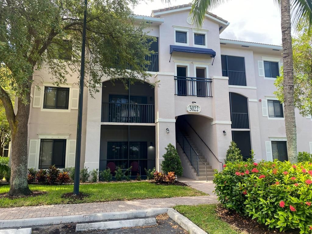 Photo of 3022 Alcazar Place #104, Palm Beach Gardens, FL 33410 (MLS # R10822933)