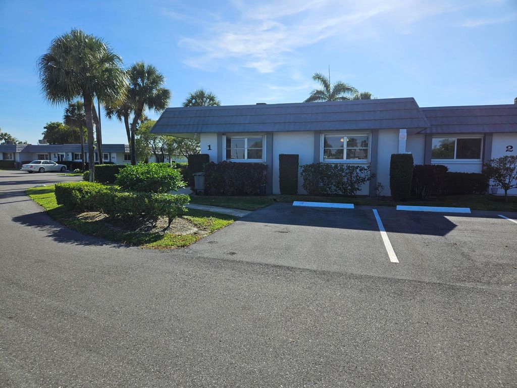 Photo of 2886 E Fernley Dr Drive E #1, West Palm Beach, FL 33415 (MLS # B26026277)