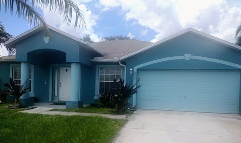 Photo of 5303 NW NASSAU Lane, Port Saint Lucie, FL 34983 (MLS # B26072825)