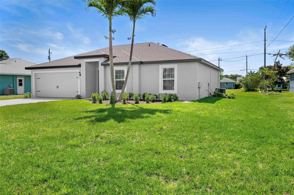 Photo of 1597 SE Berkshire Boulevard, Port Saint Lucie, FL 34952 (MLS # F10482085)