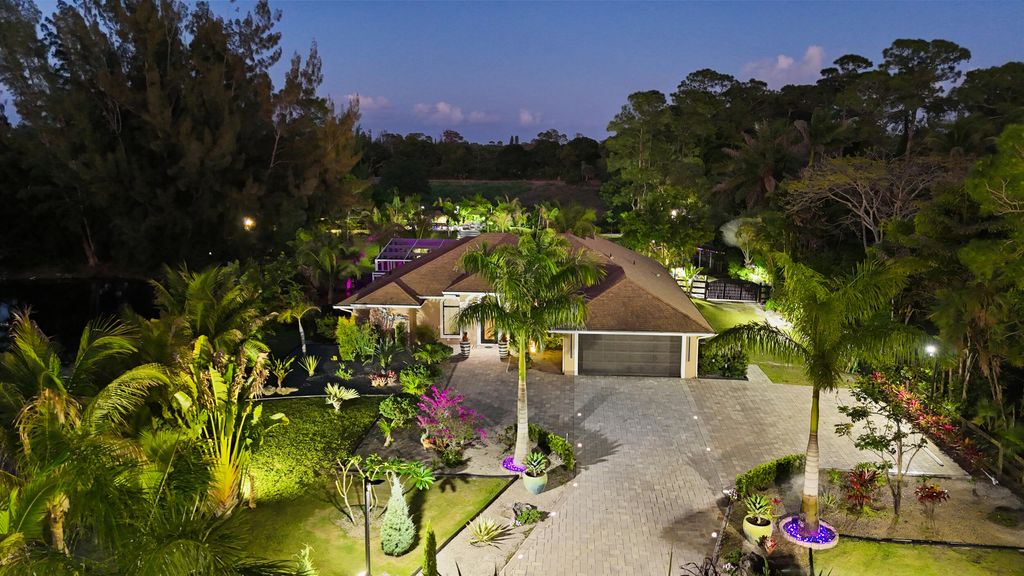 Photo of 14800 April Drive, Loxahatchee Groves, FL 33470 (MLS # B26017376)