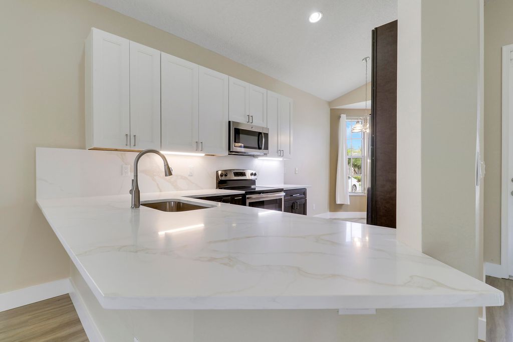 Photo of 726 SW Aruba Bay, Port Saint Lucie, FL 34986 (MLS # B26010181)