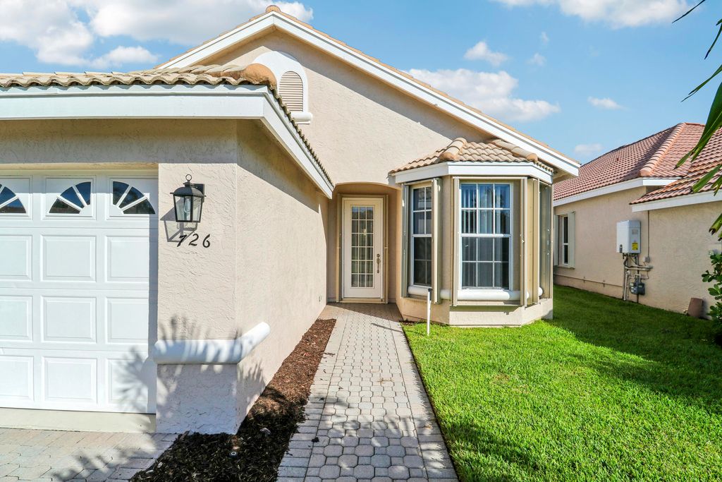 Photo of 726 SW Aruba Bay, Port Saint Lucie, FL 34986 (MLS # B26010181)