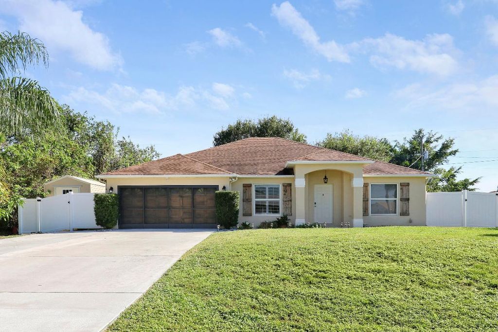 Photo of 1973 SW Erie Street, Port Saint Lucie, FL 34953 (MLS # R11054146)