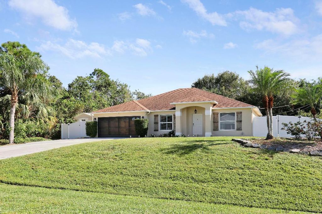 Photo of 1973 SW Erie Street, Port Saint Lucie, FL 34953 (MLS # R11054146)