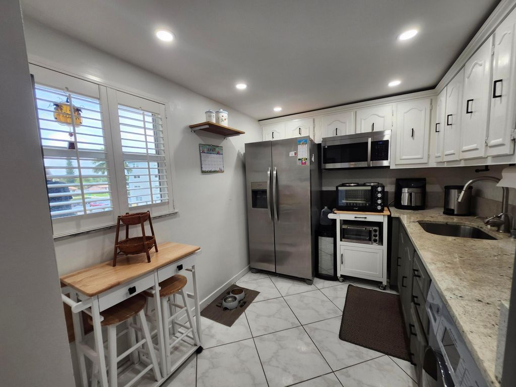 Photo of 2300 NE 1st Lane #309, Boynton Beach, FL 33435 (MLS # B26011661)