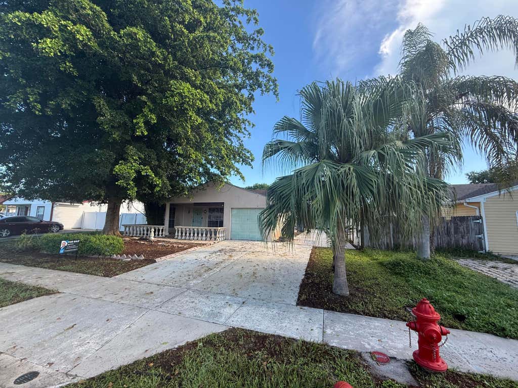 Photo of 10685 Bobbie Lane, Royal Palm Beach, FL 33411 (MLS # B26047915)