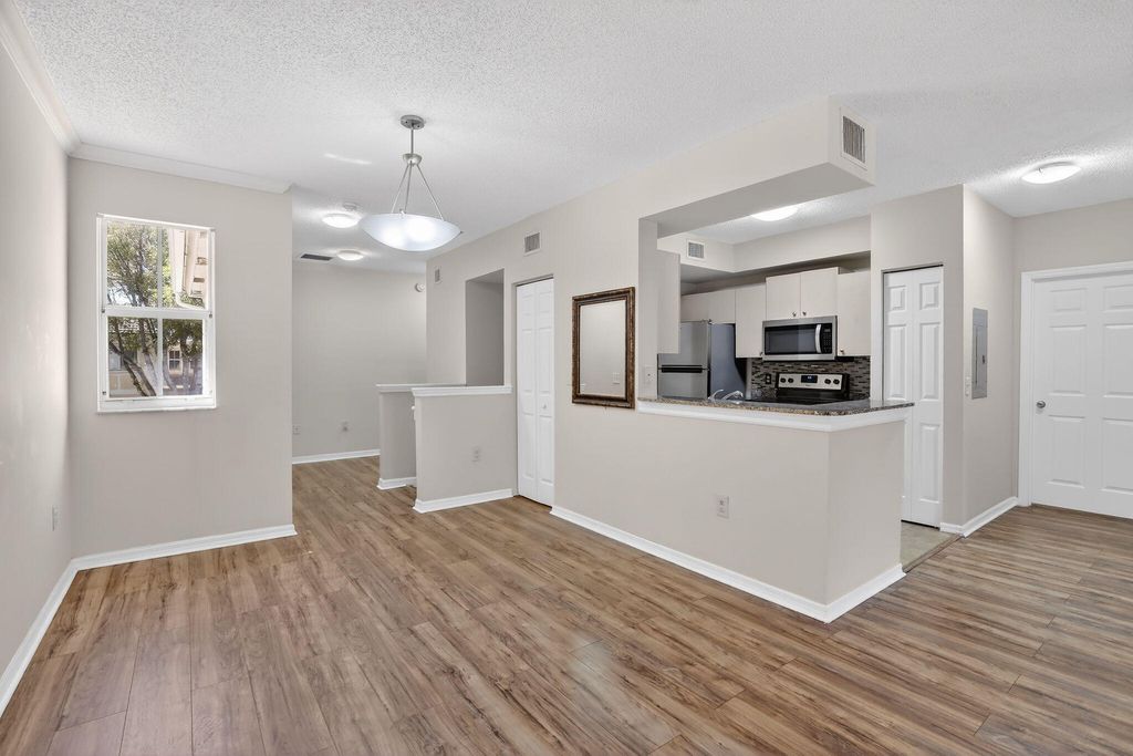 Photo of 2486 Centergate Drive #204, Miramar, FL 33025 (MLS # B26006059)