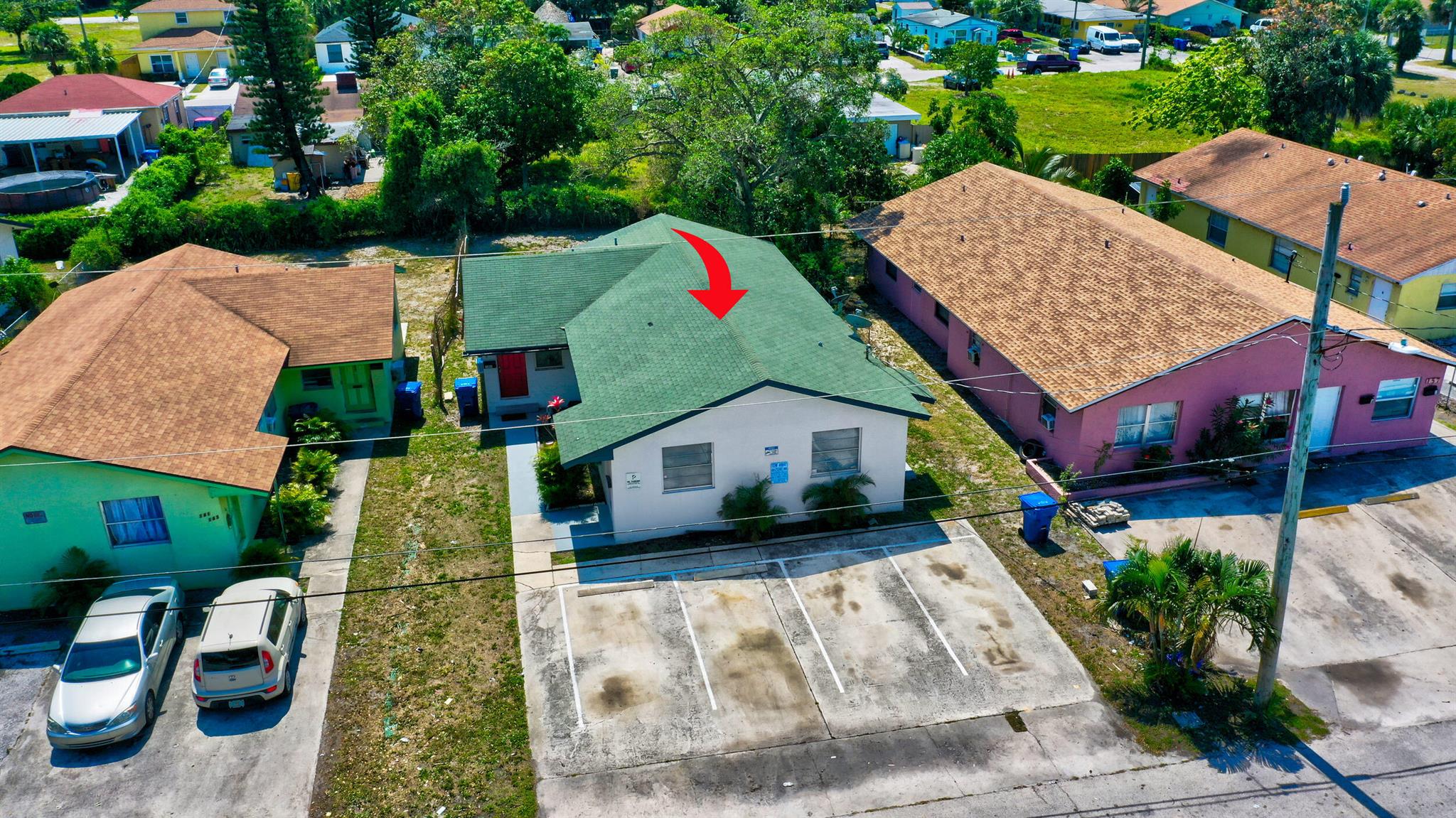 Excellent Investment Opportunity!!!! Freshly painted exterior, with pakring for 4 vehicles. Each unit is 2 bed 1 bath. Market rents are $1,800 - $2,000. Currently rented at $1,600 and $1,675. New fridge, New Stove tile floors and huge back yard. 2 blocks from Public marina and boat ramp directly in front of Peanut Island. Super close to Port of Palm beach which has huge expansion plans for more cruise ships. 60 New Townhomes being built around the corner. ''Reimagine Riviera Beach'' will bring in a new city hall, recreation centers, and a public library, among other construction projects on 80 acres.
