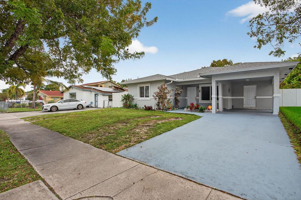 Photo of 2636 NW 9th Court, Pompano Beach, FL 33069 (MLS # R11147759)