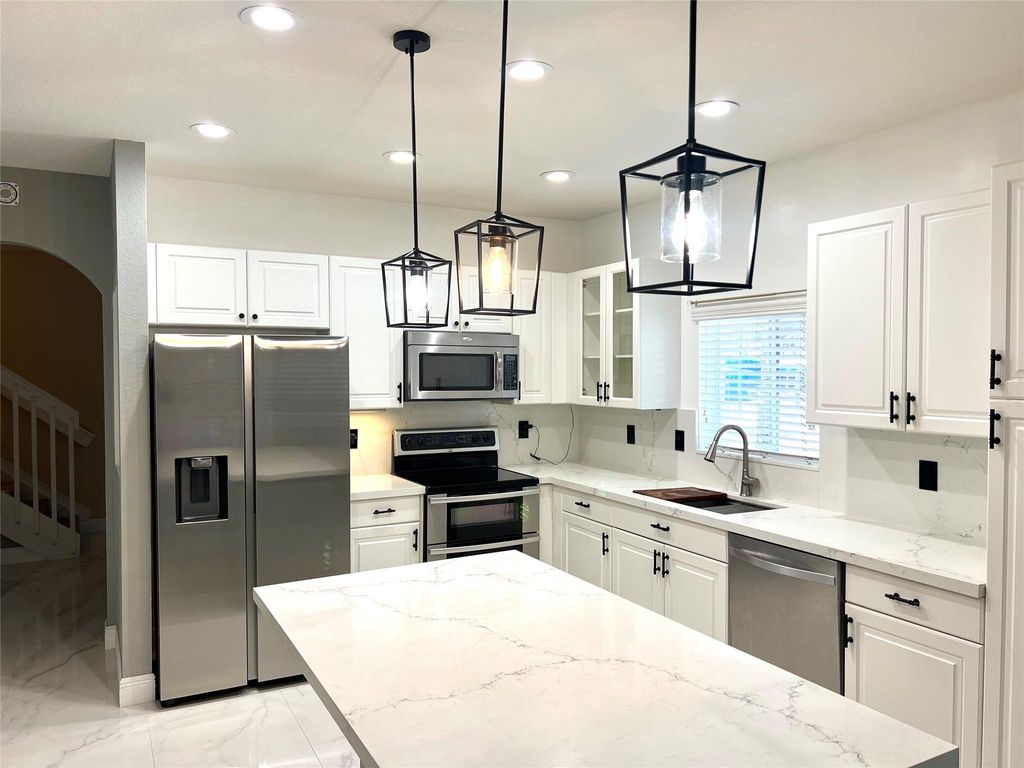 Photo of 2952 NW 33rd Lane, Lauderdale Lakes, FL 33311 (MLS # F10501379)