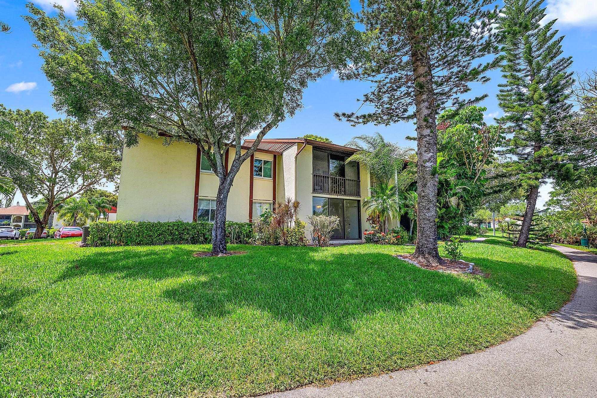 Welcome to this charming first-floor unit at 4992 Sable Pine Circle, Unit C1, West Palm Beach, FL. This cozy 2-bedroom, 2-bathroom home spans 1,115 square feet and offers tranquil lake views. Enjoy community amenities like a gym, basketball and tennis courts, shuffleboard, and a common media/recreation room. Laundry in unit. Guest parking makes it easy for visitors. Embrace the relaxed lifestyle in this delightful lowrise community of Pine Ridge!
