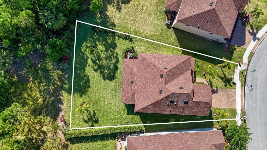 Photo of 687 NE Moss Rose Place, Port Saint Lucie, FL 34983 (MLS # R10999107)