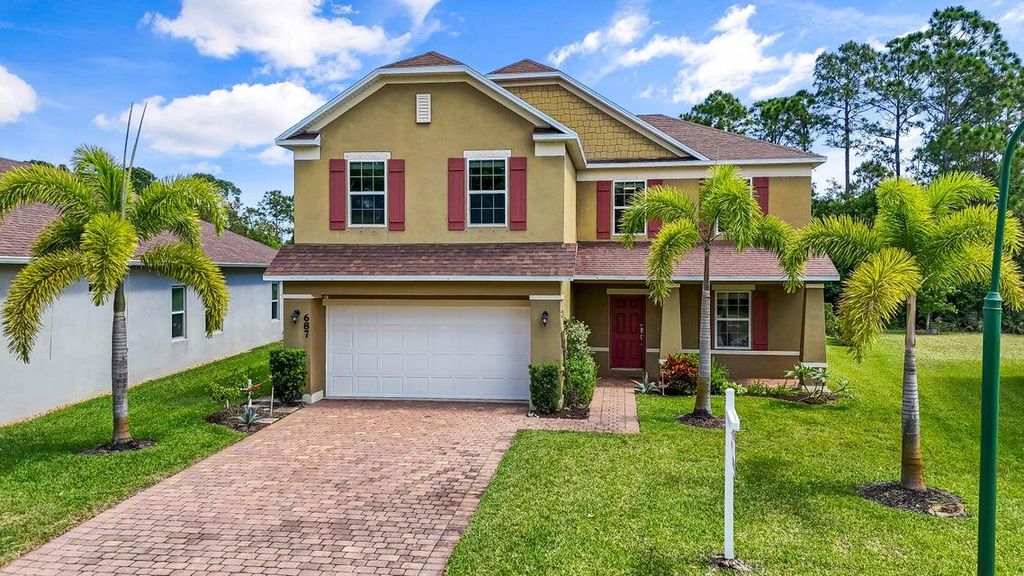Photo of 687 NE Moss Rose Place, Port Saint Lucie, FL 34983 (MLS # R10999107)