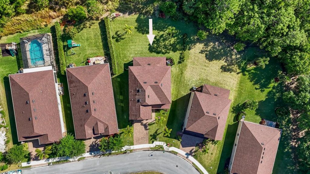 Photo of 687 NE Moss Rose Place, Port Saint Lucie, FL 34983 (MLS # R10999107)