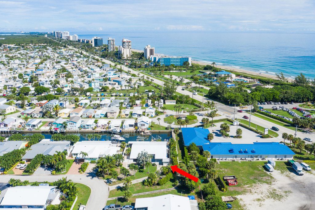 Photo of 18 Aqua Ra Drive, Jensen Beach, FL 34957 (MLS # R11167805)