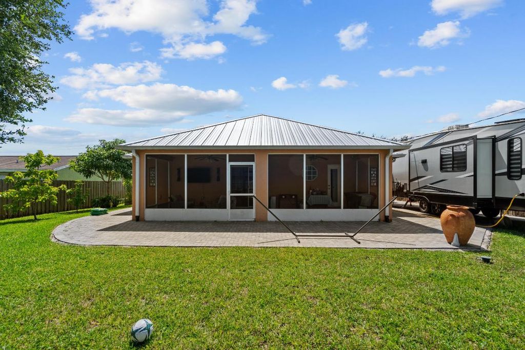 Photo of 237 NW Bayshore Boulevard, Port Saint Lucie, FL 34983 (MLS # R11111046)