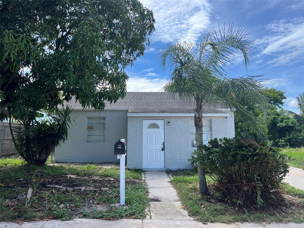 Photo of 841 W 4th St, Riviera Beach, FL 33404 (MLS # F10456661)