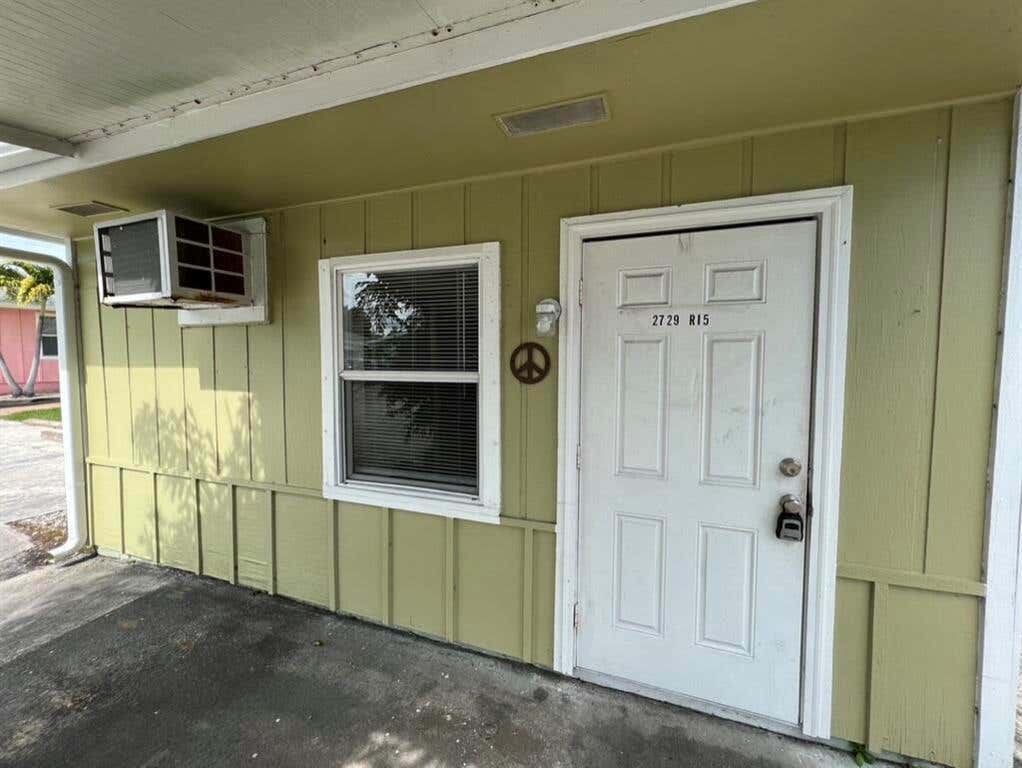 Photo of 2729 Richard Road Rd #1/2, West Palm Beach, FL 33403 (MLS # R10811335)