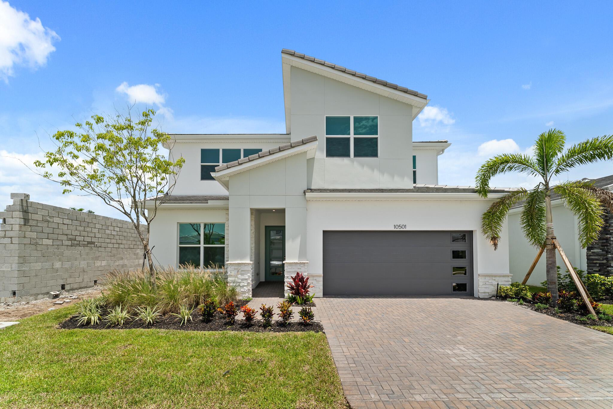 The Wynn is a 2,900 sq. ft. 2-story home that offers 4 bedrooms, 3.5 baths and 2-car garage. Upon entering the foyer, you are welcomed to an open floorplan. The spacious kitchen offers an extensive walk-in pantry and an island breakfast bar. The kitchen overlooks the dining area and Great Room. A sliding glass door in the Dining Room leads to the covered lanai. Bedroom 4, located on the first floor, connects to a full bath and walk in closet. The second floor is complete with a loft, owner's suite and bath, two additional bedrooms and a full bath. The roomy loft offers a flexible living space. The owner's suite boasts a large walk-in closet and is connected to the owner's bath with a spacious shower and dual sink raised vanity.