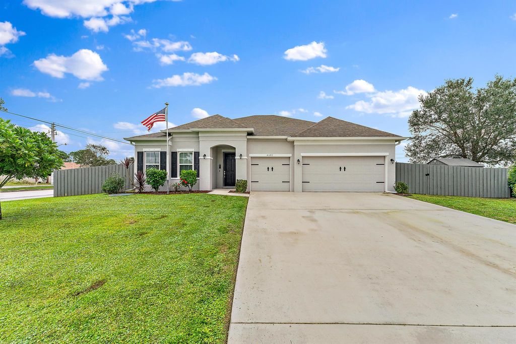 Photo of 4601 SW Alpha Street, Port Saint Lucie, FL 34953 (MLS # R10949057)