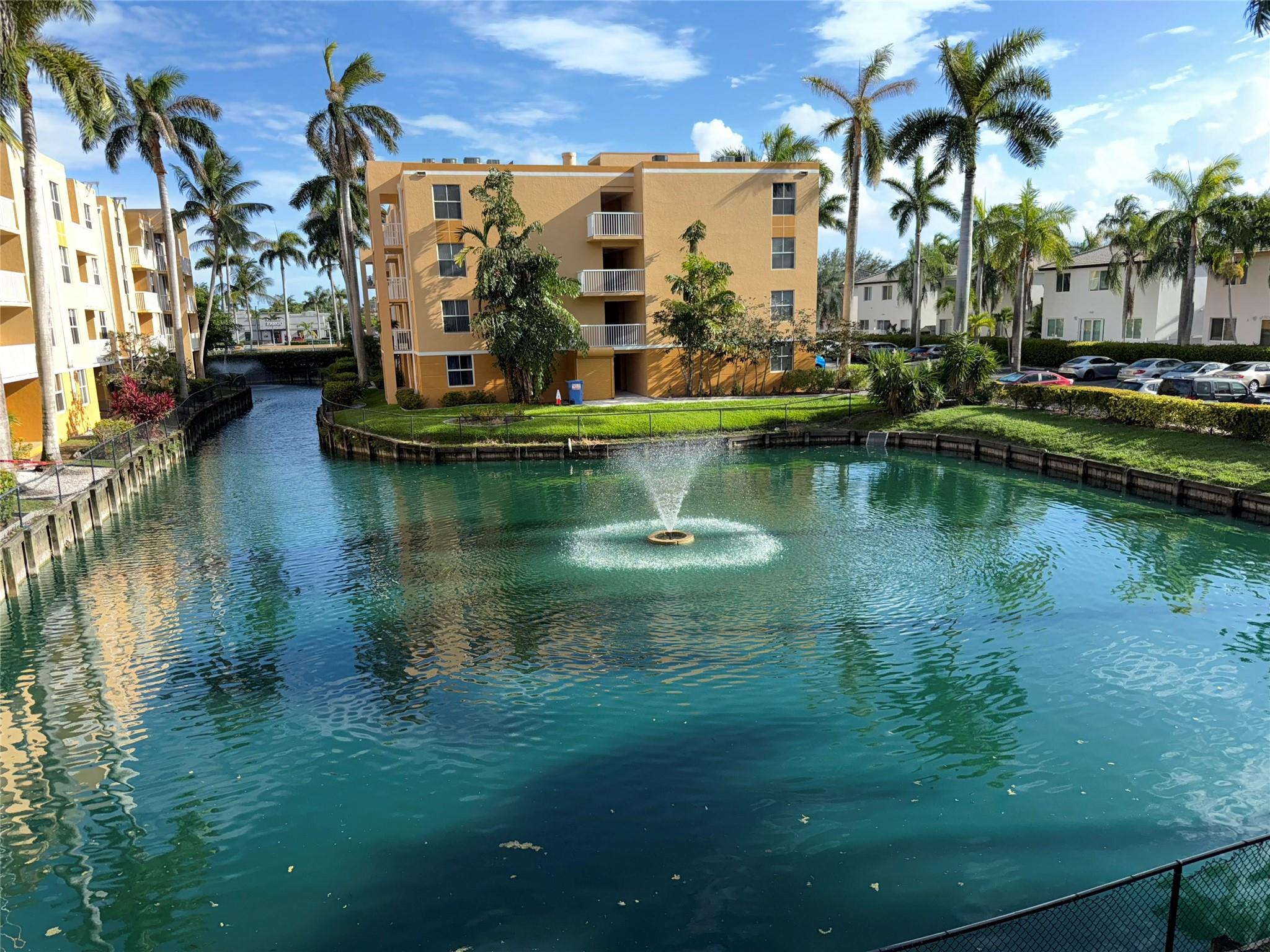 COME SEE THIS TOTALLY REMODELED 2/2 CONDO WITH THE WIDEST VIEWS OF THE LAGOON AND FOUNTAIN FROM ALL ROOMS AND FROM THE OPEN BALCONY. IMPACT WINDOWS THROUGHOUT. ROOF WAS JUST INSTALLED AND ALL ASSESSMENTS HAVE BEEN PAID BY SELLER. BEAUTIFUL GRANITE COUNTER TOPS IN THE KITCHEN THAT OFFERS A PASS THROUGH TO THE DINING AREA. ALL NEW MAYTAG STAINLESS STEEL APPLIANCES. WASHER AND DRYER ARE INSIDE THE UNIT. ALL NEW TILE THROUGHOUT THE HOME AND CROWN MOLDING. THE A/C AND HOT WATER HEATER WAS REPLACED IN 2022. LARGE PRIMARY BEDROOM WITH GREAT VIEWS OF THE FOUNTAIN AND GREAT BUILT-OUT CLOSET. PRIMARY BATHROOM OFFERS A DOUBLE SHOWER WITH AN AWESOME SOAKING TUB IN THE GUEST BATHROOM. OWNER WILL CONSIDER SELLING THE FURNITURE IN THE PURCHASE.