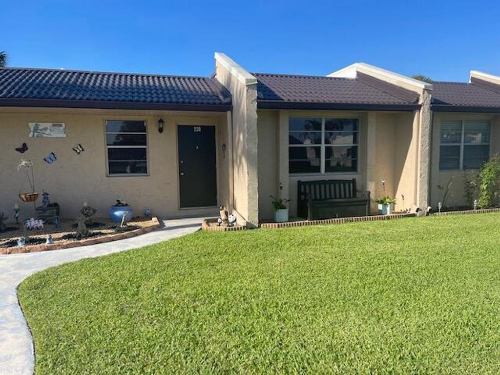 Photo of 230 Lake Meryl Drive, West Palm Beach, FL 33411 (MLS # R10811235)