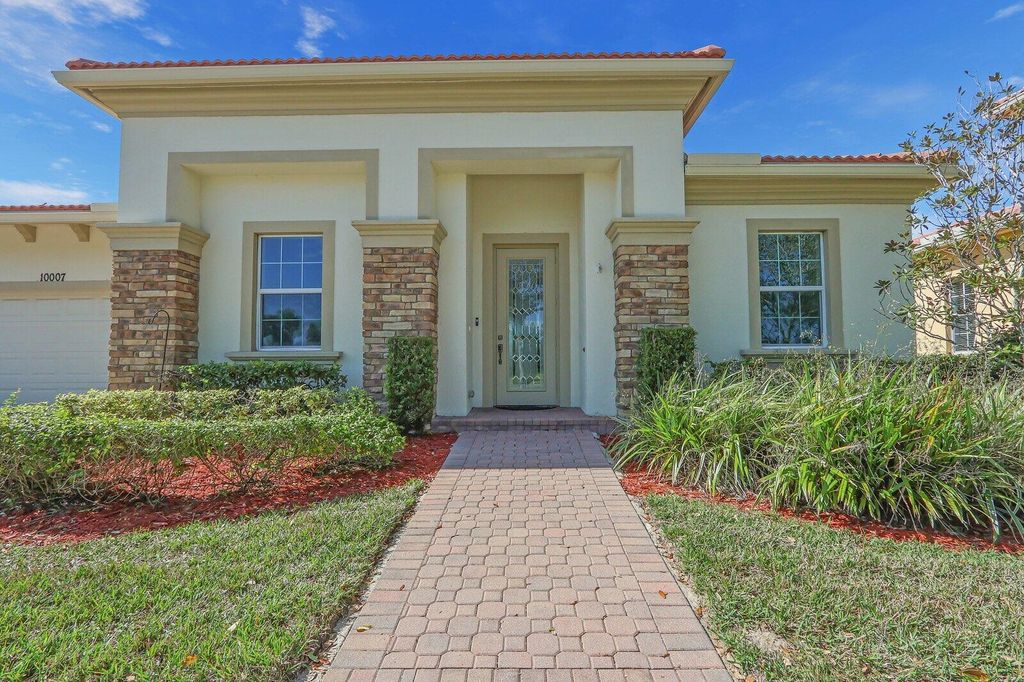 Photo of 10007 SW Ambrose Way, St Lucie West, FL 34986 (MLS # R11125498)
