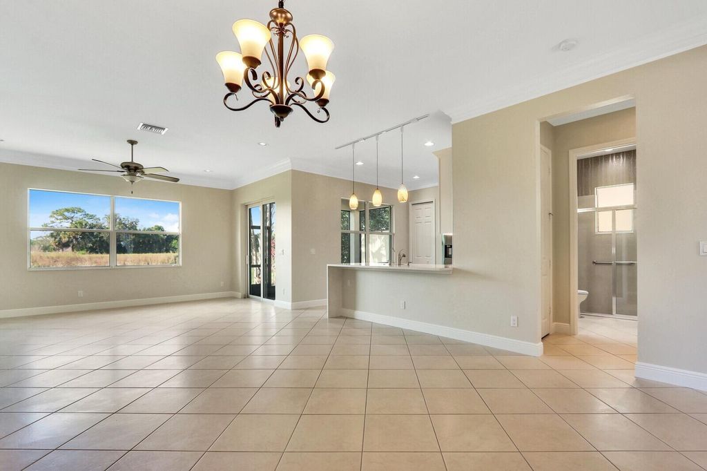 Photo of 10007 SW Ambrose Way, St Lucie West, FL 34986 (MLS # R11125498)