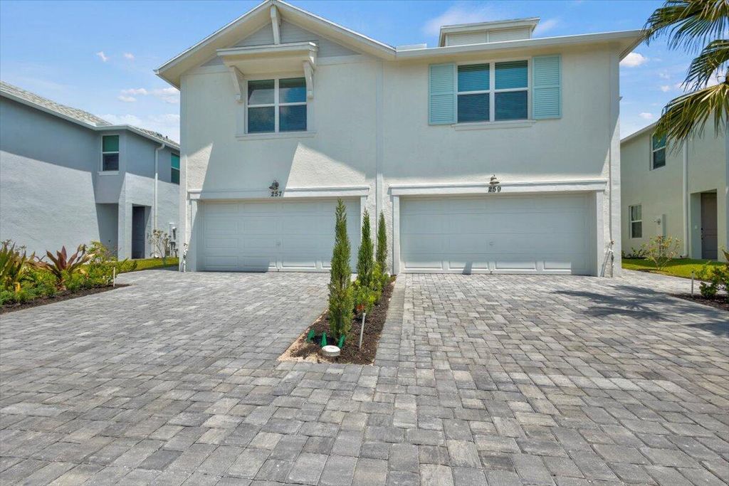 Photo of 259 Osprey Preserve Boulevard #259, Jensen Beach, FL 34957 (MLS # R11021381)