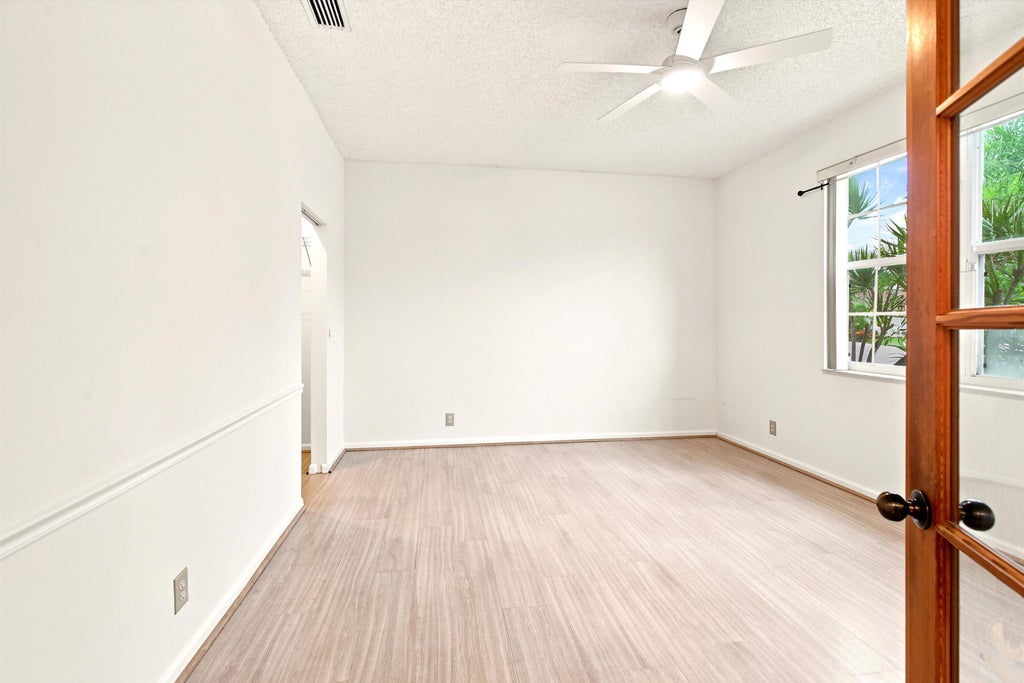 Photo of 1490 Fairway Circle, Greenacres, FL 33413 (MLS # B26058279)