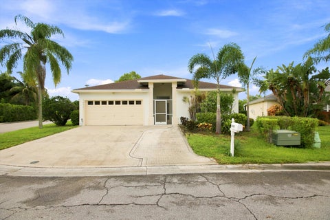 Photo of 1490 Fairway Circle, Greenacres, FL 33413 (MLS # B26058279)