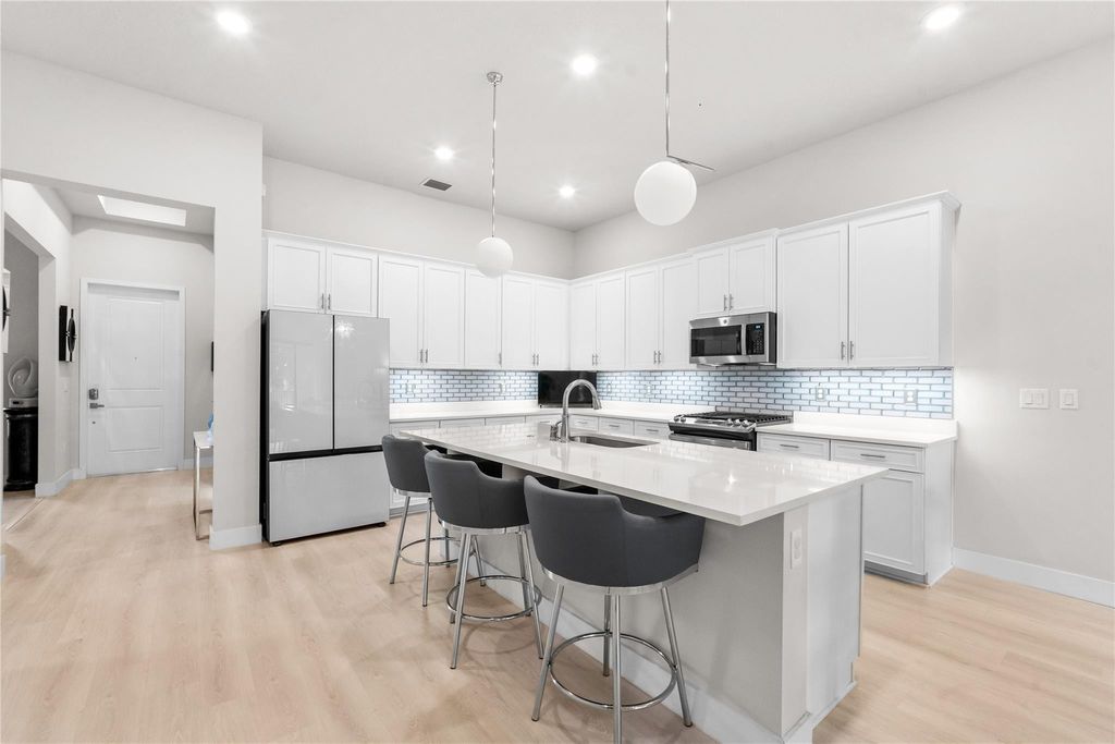 Photo of 7636 N Blue Spring Drive #7636, Parkland, FL 33067 (MLS # F10556859)