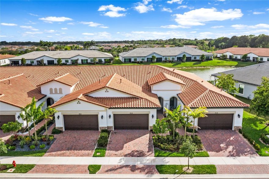 TURNKEY 3 Beds, 2 Baths w/2-Car Garage Waterfront Villa In The Prestigious Gated Community Of The Falls At Parkland!  Impact Windows & Doors, Fenced-In Yard Overlooking Stunning Water Views, Screened-In Patio Ideal For Barbecues & Entertaining, Updated Oak Vinyl Floors Throughout, Chef's Kitchen w/Quartz Counters, California Closets, Island, Backsplash, & Stainless Steel Appliances Including Samsung Fridge, Primary Bed w/Sitting Area & Direct Access To Patio Area, Bath w/Quartz Counters, Large Shower, & Walk-In Closet w/Built-In's, Updated Light Fixtures & Window Treatments, Separate Laundry Room w/Newer Washer & Dryer, Live The Adult Lifestyle w/Resort-Style Amenities  Including 24,000 SqFt Clubhouse, Heated Pool, & Spa, Fitness Center, Cafe, Theater, Teniis & Pickleball, Events, & More!