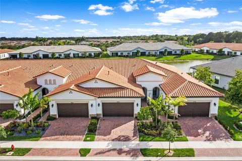 Photo of 7636 N Blue Spring Drive #7636, Parkland, FL 33067 (MLS # F10556859)