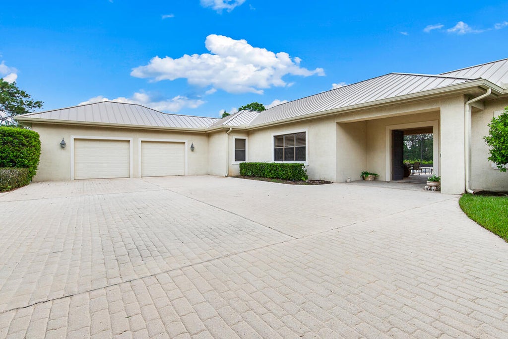 Photo of 3151 SW BUENA VISTA Drive, Palm City, FL 34990 (MLS # B26073029)